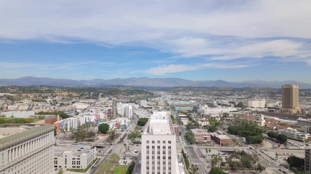 Gimbal wide panning shot looking north towards Chinatown and El Pueblo from the observation deck at City Hall in downtown Los Angeles, California. 4K