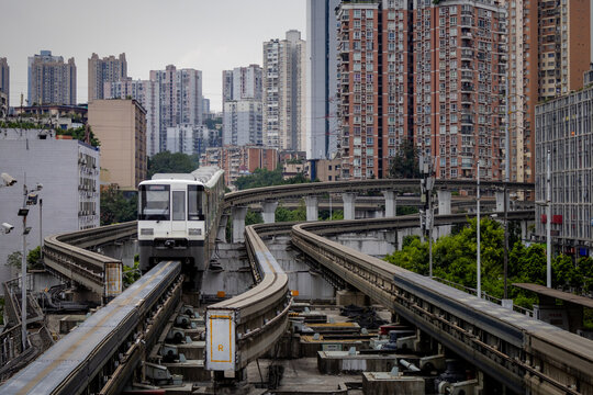 Subway train surrounded by buildings in central downtown Chongqing, China