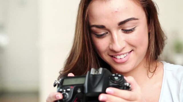 Happy woman, face and photographer with camera, countdown or thumbs up for capture in home studio. Portrait, female person or photoshoot with lens, smile or like emoji for good photography in house
