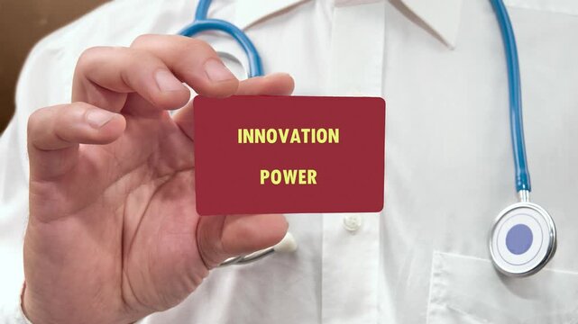 Medical professional holds red card. Innovation Power text gradually appears on card surface. Doctor wears white coat and stethoscope