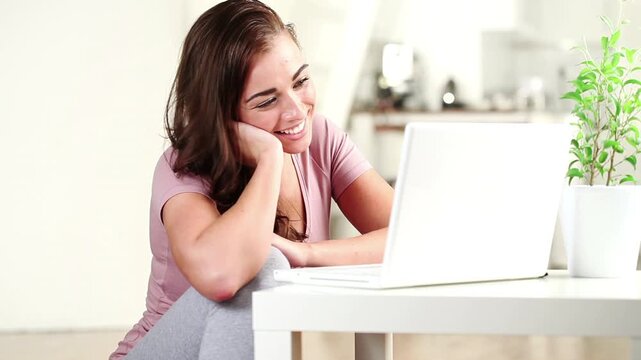 Video call, wave or woman in house with laptop, online chat or greeting on dating site. Happy, hello or female person in home with tech, digital conversation or connection on matchmaking platform.