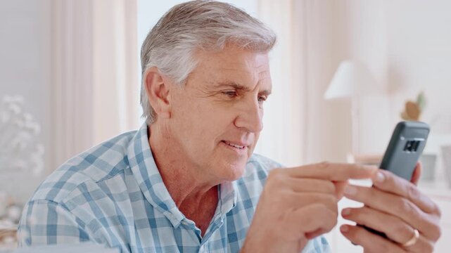 Elderly, man and thinking with phone in home for online research, decision or tough choice. Senior, male person or scrolling with mobile smartphone for web browsing, selection or pick on app in house