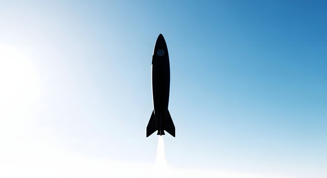 Rocket Launch Against the Sky: The silhouette of a rocket gracefully ascends into a clear blue sky, igniting a trail of vapor and smoke. Its upward trajectory symbolizes progress and exploration