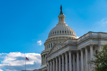 Obraz premium The Capitol building in Washington. Architecture view on dome with column. Famous Capitol in Washington DC. Washington DC landmark. Senate and House in Washington DC. Capitol dome, copy space