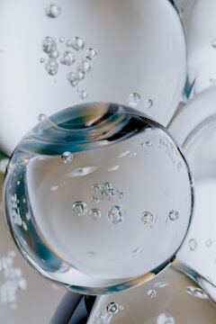 3D iridescent bubble group with glossy sphere and trapped air