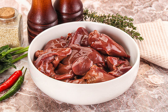 Raw uncokked chicken liver in the bowl