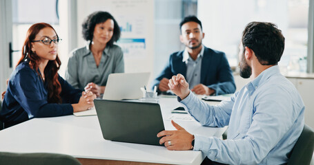 Obraz premium Laptop, presentation and research with business people in meeting for acquisition, finance advisor and liquidity. Brainstorming, speaker and online report with employees in corporate firm for team