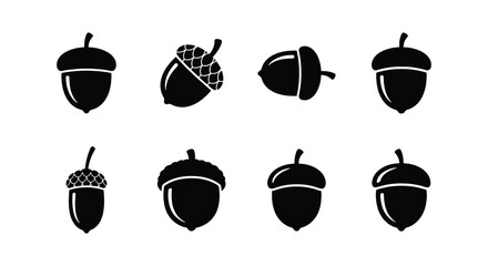 Acorn icon set, 8 black oak nut silhouettes, autumn forest seed vector symbols © Designhoost Ltd