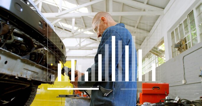 Working mechanic in blue coveralls using tool on open engine bay at workshop with UI overlay