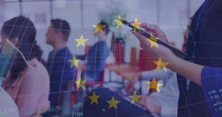 Watching seated staff in business attire in office viewing EU graphs, tablet with stylus, lanyard © vectorfusionart