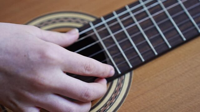 Learn basic guitar chords with simple hand positions