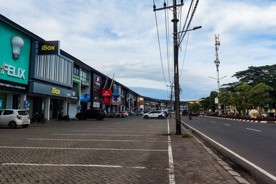 Makassar, Indonesia, December 27, 2025,  Shophouses are neatly lined up in the business center area with spacious parking.