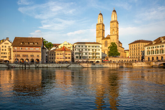 Grossm�nster and waterfront at sunset on river Limmat in Zurich