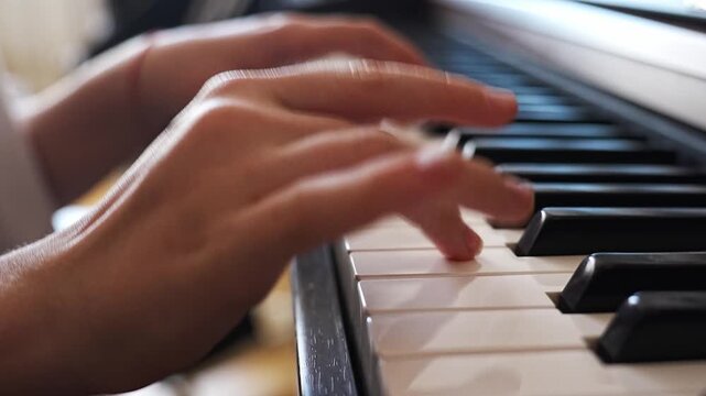 Learn simple piano techniques through four close-up frames