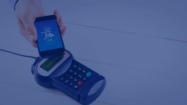 Animation of red dots over smartphone and payment terminal