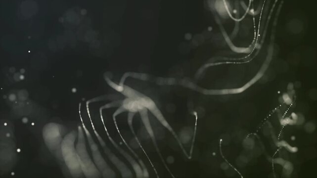 Elegant golden glitter particles floating in a dark abstract space with soft bokeh lights &mdash; ideal for premium titles, celebrations, and luxury visuals.