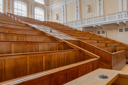 Wooden Benches in Lecture Hall Auditorium University. Inside classroom education study.
