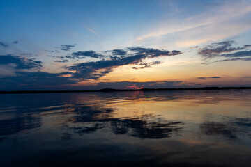 Obraz premium Colorful sunset over the lake. Mietkowski Lake, Poland