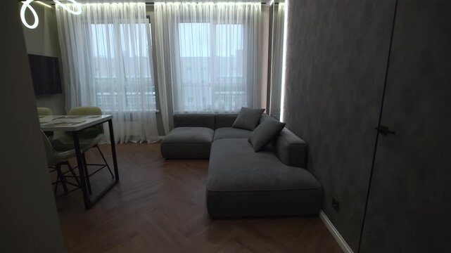 Stylish Living Space Display. Charming Lounge Arrangement Featuring Soft Light And Plush Furnishings . Media