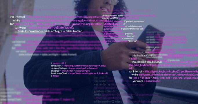 Holding smartphone, man in hoodie with eyeglasses viewing magenta code overlay at window