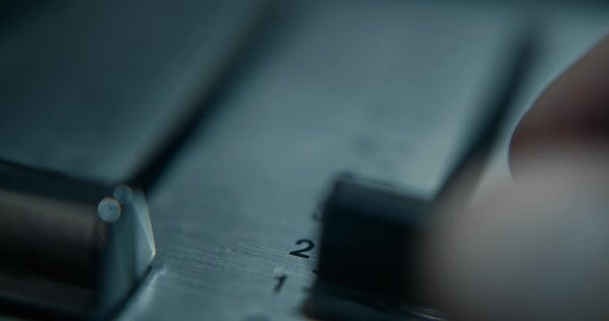 Leveling a vintage tape recorder.