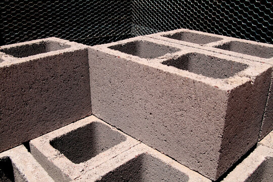 Stacked Concrete Cinder Blocks on Construction Site with Industrial Texture