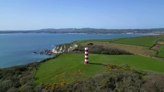 
Gribbin Head, Cornwall, England: DRONE VIEWS: A circling shot of the Gribbin Daymark (Gribbin Head Tower). The Daymark was erected in 1832 as an aid for seafarers to identify the River Fowey estuary.