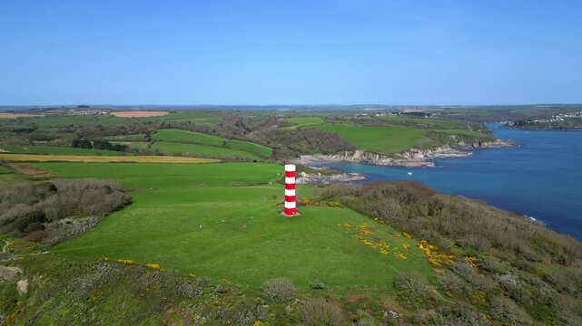 
Gribbin Head, Cornwall, England: DRONE VIEWS: A circling shot of the Gribbin Daymark (Gribbin Head Tower). The Daymark was erected in 1832 as an aid for seafarers to identify the River Fowey estuary.