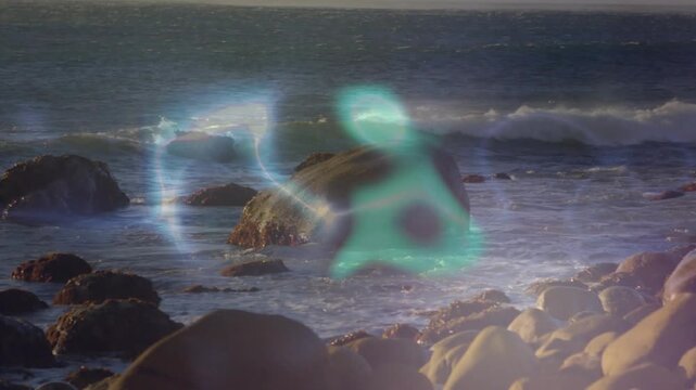Sunlight starting cyan form and blue ribbon pulsing splitting looping over rocks showing tidal flow