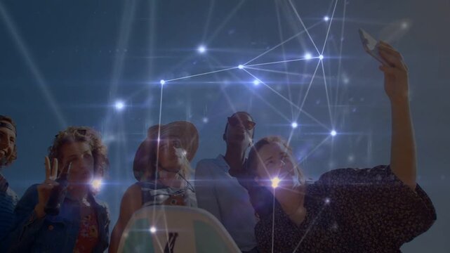 Sunlight aligning with camera, overlay flaring as five friends raising phone, capturing surf day
