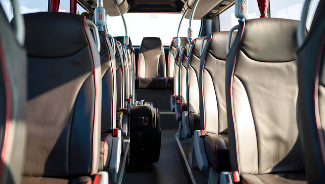 Interior Coach Perspective: A modern bus interior with rows of comfortable seats, offering a glimpse into the world of travel. Capture the essence of public transport and transit.