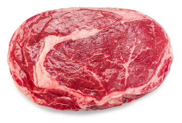 Fototapeta premium Raw ribeye steak isolated on white background. Top view. Clipping path.