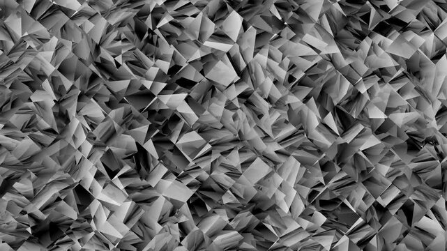 Abstract geometric crystal background, monochrome sharp polygonal texture, dark metallic faceted surface with light reflections and shadows