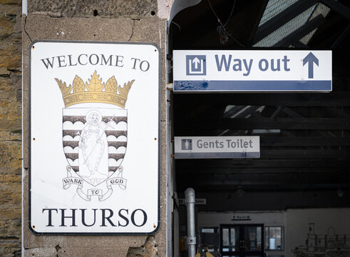 Welcome to Thurso and Way Out sign at Thurso Railway Station, Scottish Highlands,  Caithness,  Scotland, UK
