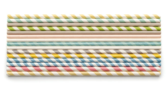 Drinking straws with colorful stripes lie in a neat parallel arrangement.