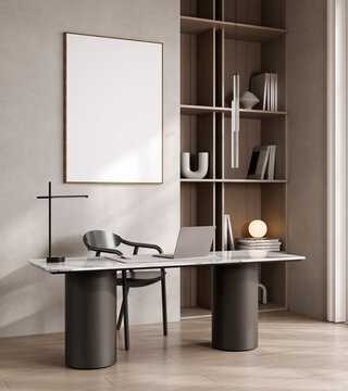 Modern minimal home office desk with laptop and blank frame