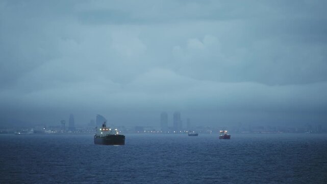 Cargo Tanker Ships Sailing Barcelona Bay at Moody Night