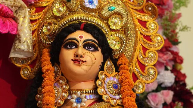 lose up of Goddess Lakshmi idol in India, showing divine expression, intricate details