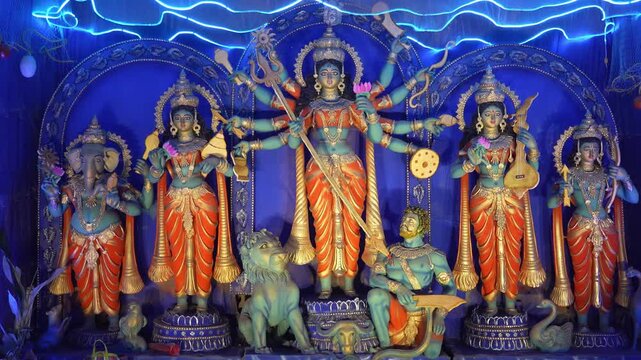 Cinematic view of Durga idol in Kolkata India during Durga Puja festival, showcasing intricate design