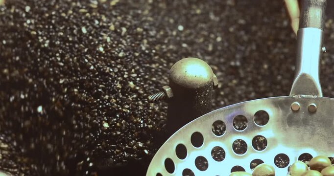 Roasting chestnuts in a hot pan, rolling and heating. Ideal for food, snack, street food, and cozy winter concepts