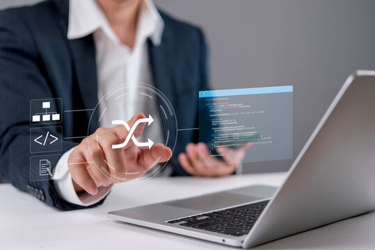 Businessman hand pointing digital hologram interface API integration coding window laptop software development system architecture programmer programming concept.