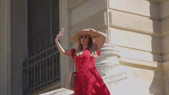 Stylish Woman Takes Selfie at Historic Palais Longchamp, Marseille