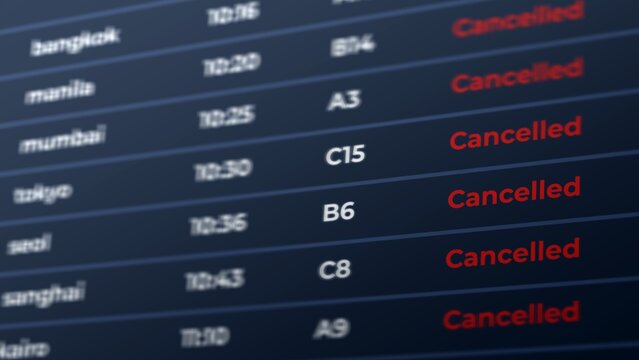Flight Cancelled Status on Airport Display Board, Travel Disruption Concept