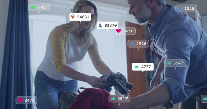 Couple packing suitcase for trip, first icon appearing, handing clothes and placing, icons growing