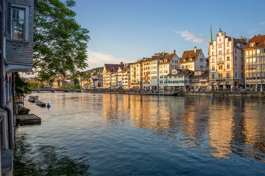 Historic buildings along Limmatquai Zurich at sunset in summer