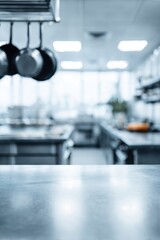 Fototapeta premium Wide Background View of a Clean Commercial Kitchen With Shiny Surfaces and Empty Space for Restaurant Cleaning Advertisement