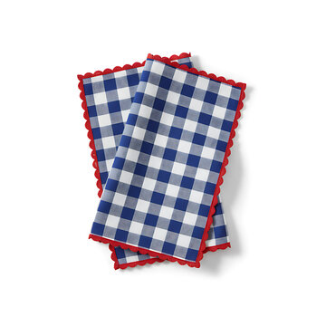 Blue and white gingham checkered cloth napkin with a red scalloped border  isolated on white background,