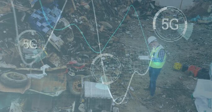 5g text over multiple round scanners and graphs moving over male engineering working at junkyard