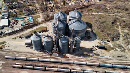 Drone view of industrial grain facility with railway and cargo transport © Viola