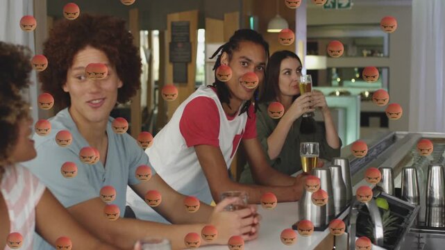 Three patrons talking at bar, conversation sparking social backlash via angry emojis covering faces